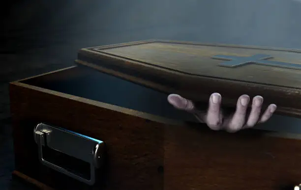 A slightly open empty wooden coffin with a hand reaching out on a dark ominous background - 3D Render