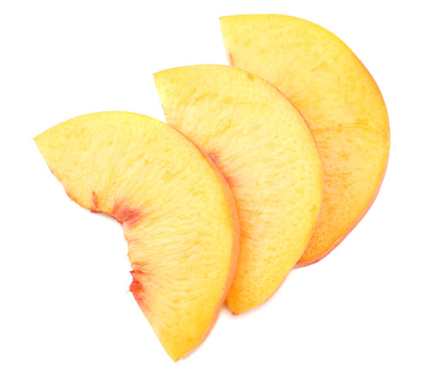 istock peach fruit slices isolated on white background. top view 1036586024