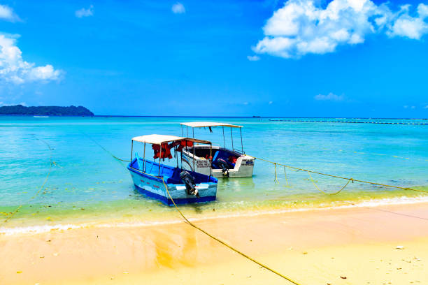 istock Boats In A Sea Beach 1036590858