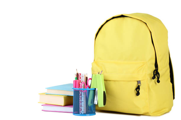 istock Yellow backpack with school supplies on white background 1036599226