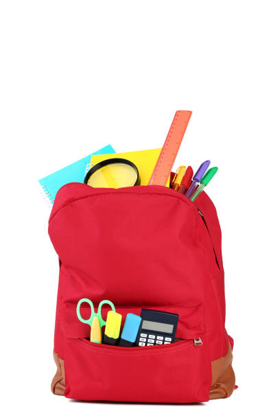 istock Red backpack with school supplies on white background 1036604144