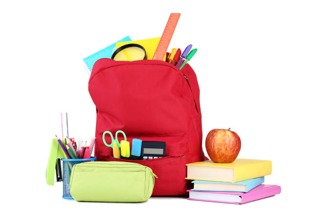 istock Red backpack with school supplies on white background 1036604818