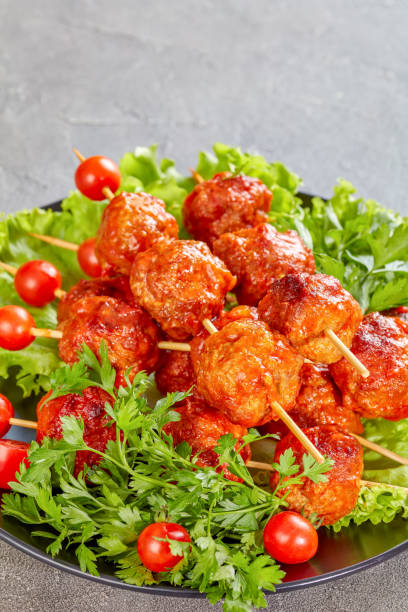 istock meatballs on skewers with fresh tomatoes 1036606492