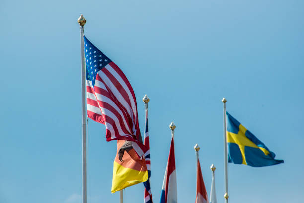 istock Low angle view of vawing American flag 1036606798
