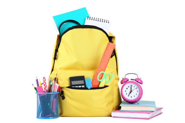 istock Yellow backpack with school supplies on white background 1036606836
