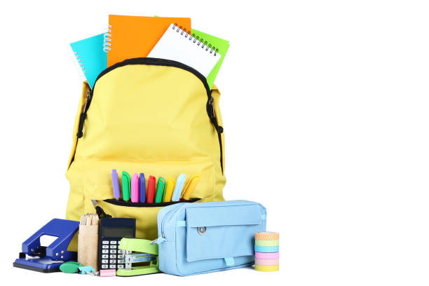 istock Yellow backpack with school supplies on white background 1036609872