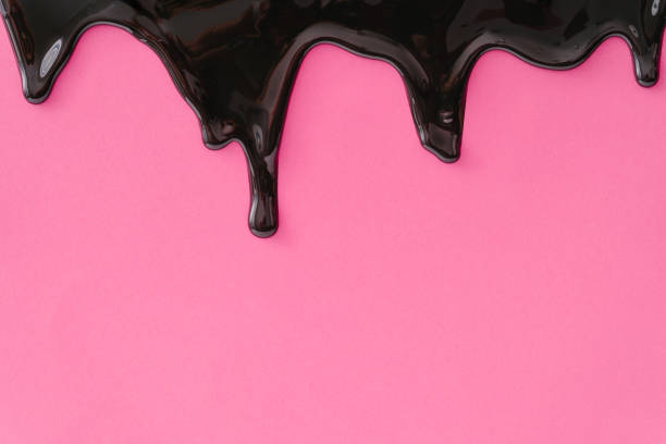istock Pastel pink background with black dripping paint. 1036611264
