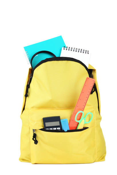 istock Yellow backpack with school supplies on white background 1036615750
