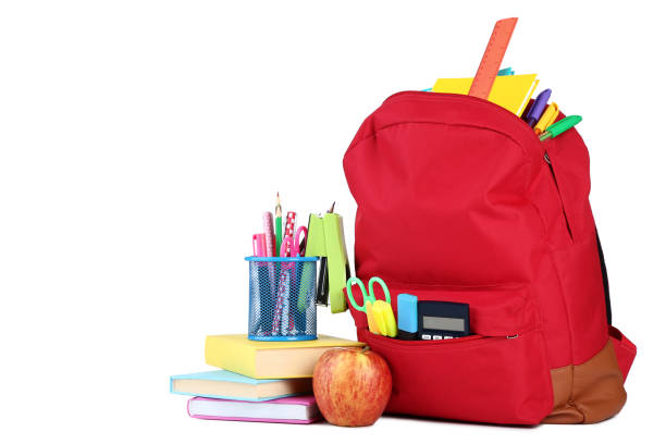 istock Red backpack with school supplies on white background 1036616124