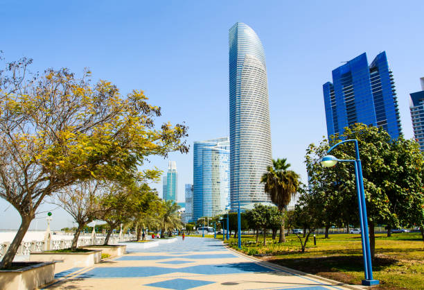 istock Abu Dhabi Corniche with landmark view of modern buildings 1036621602