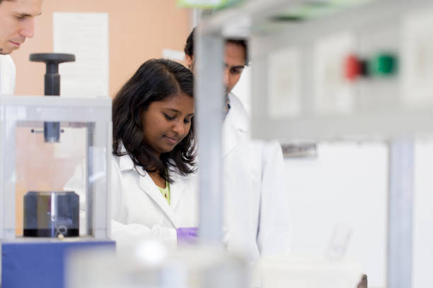 istock Multiethnic group of scientist working on a research project 1036625638