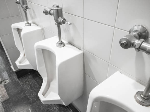 white urinal in the toilet room - urinal clean contemporary in a row imagens e fotografias de stock