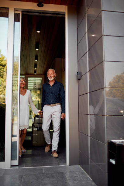 istock Senior Couple In Hotel 1036627722