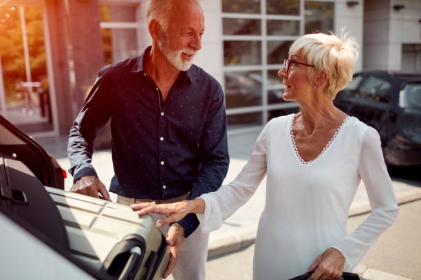 istock Senior Couple In Hotel 1036630922