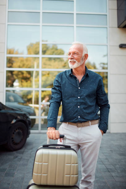 istock Senior Businessman In Hotel 1036630946