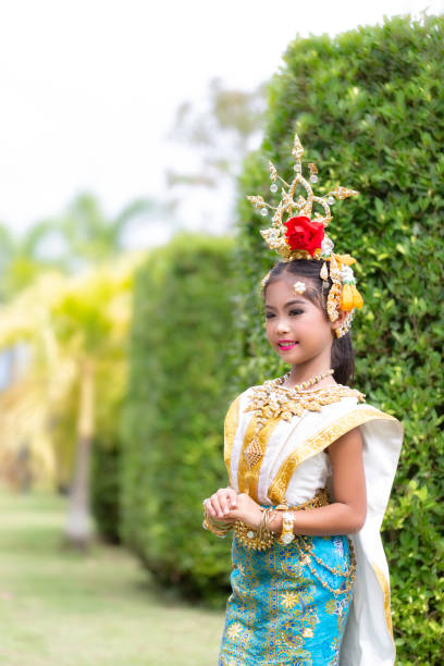 Thai girl in tradition dress a cute Thai girl in traditional dress to perform Thai drama dance dramatise stock pictures, royalty-free photos & images