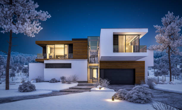 istock 3d rendering of modern house by the river in winter night 1036637760