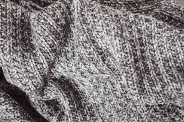 istock Warm wool gray knitted crumpled plaid. Home cosiness 1036644472