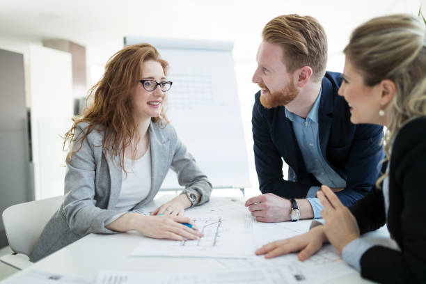 istock Creative business people working on business project in office 1036647766