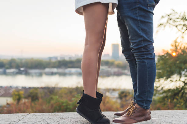 istock Young couple kissing in summer sun light 1036651302