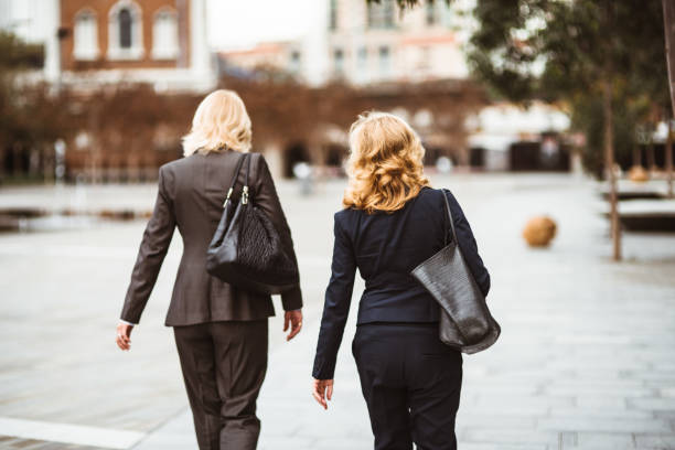 istock business colleagues walking on the city 1036652032