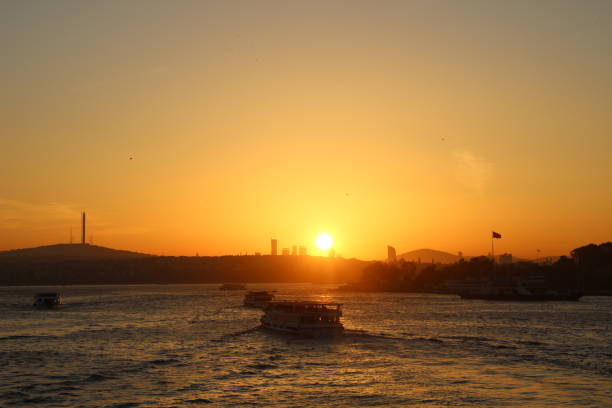 istock tourist boats in the Bosphorus during sunrise 1036654740