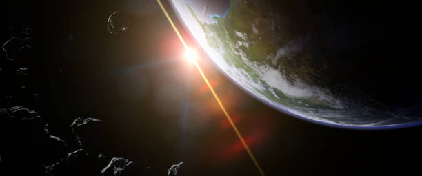 istock a swarm of asteroids moving towards planet Earth 1036682030