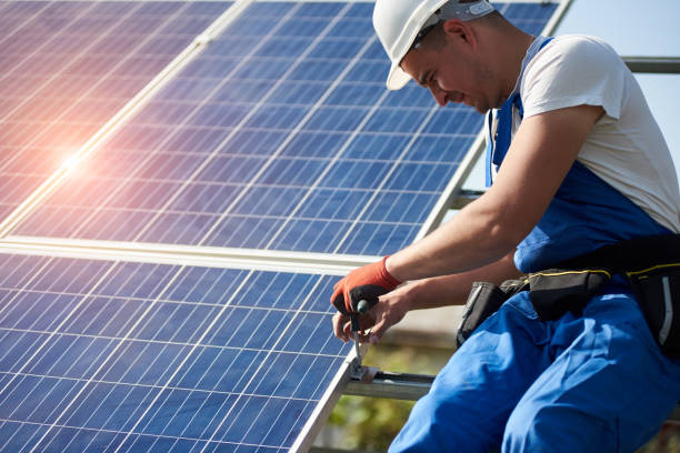 istock Stand-alone exterior solar panel system installation, renewable green energy generation concept. 1036688348