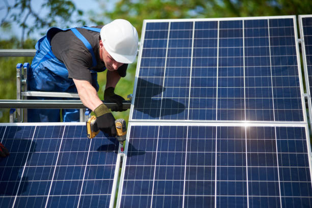 istock Stand-alone exterior solar panel system installation, renewable green energy generation concept. 1036689632