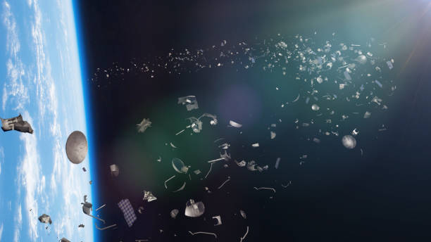 istock space trash in Earth orbit, dangerous debris orbiting around the blue planet 1036692972
