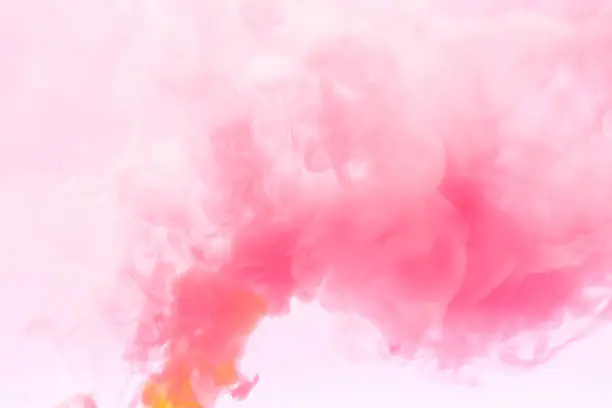 Photo of Pink smoke abstract on white background, swirling pink and white smoke background.