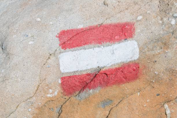 istock Red white red hiking trail marking in Austria 1036698572