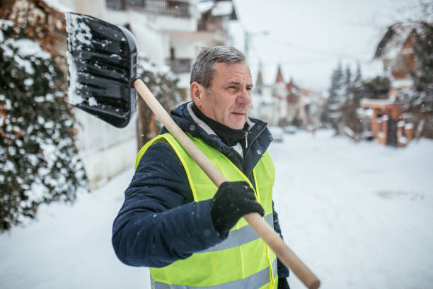 istock Man After Shoveling Snowy Parking 1036707670