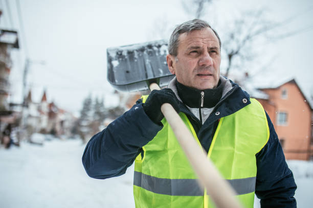 istock Man After Shoveling Parking Lot 1036707828