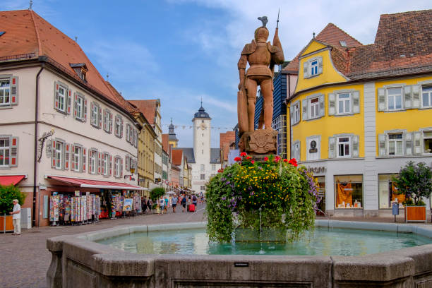 Tourists visiting the old town of Bad Mergentheim, a spa town since 1926. The town is part of the famous Romantic Road (Romantische Straße), the \