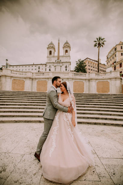 istock Young wedding couple on Spanish stairs in Rome 1036736966