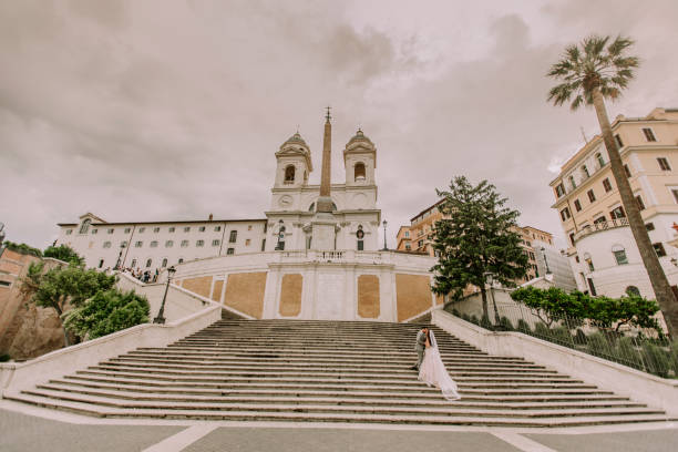 istock Young wedding couple on Spanish stairs in Rome 1036737018
