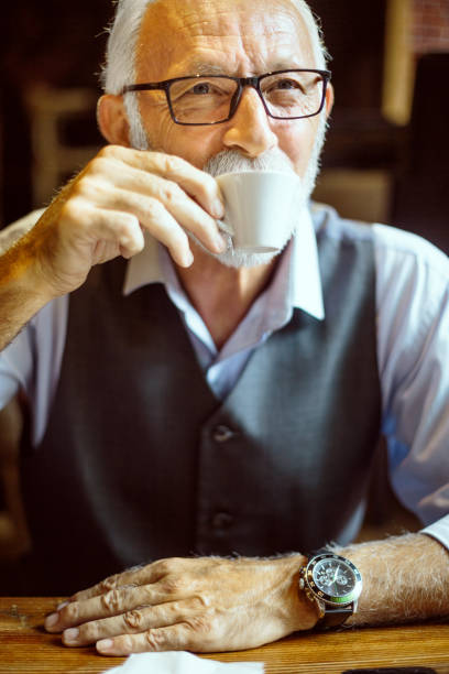 istock Senior businessman drinking coffee 1036742788