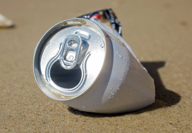 istock Abandoned can of beer on the beach. The problem of environmental pollution. 1036747392