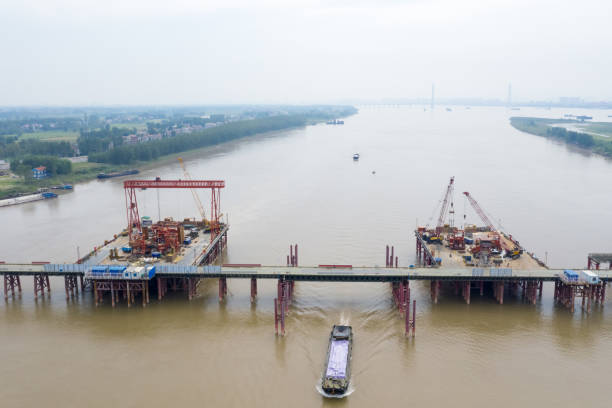 istock aerial view of bridge construction site on the yangtze river 1036748496
