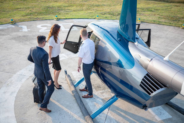 istock Helicopter passengers about to board 1036756634