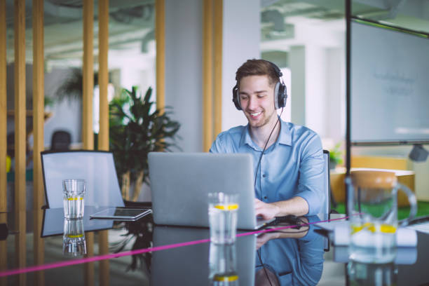 istock Young man is watching videos on internet 1036757986