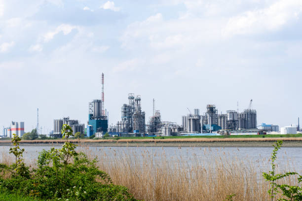 Big industrial construction for fuel and power generation across the naval river in Antwerpen harbor area.