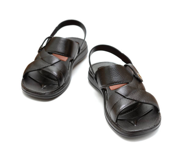istock pair of black leisure sandal on white background 1036766784