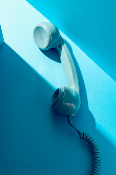 istock Vintage Headphone on a Blue Background Concept Idea 1036774582