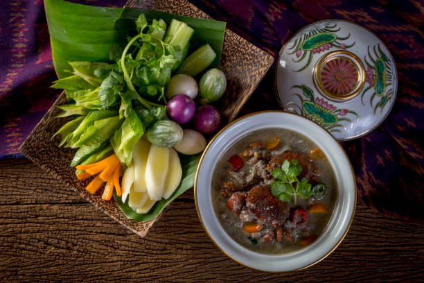 istock Crab dip with coconut milk and vegetables (Thai food) 1036777894