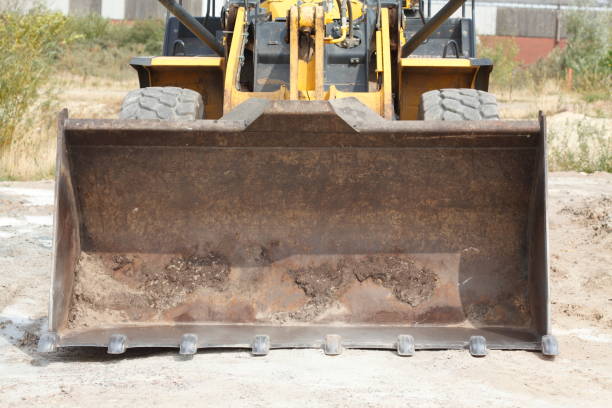 istock Excavator with excavator shovel on a construction site 1036808784