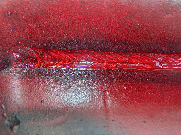 istock Dye penetrant inspection, also called liquid penetrant inspection or penetrant testing for weld metal. It is used to detect steel materials surface defects such as cracks and surface porosity. 1036809354