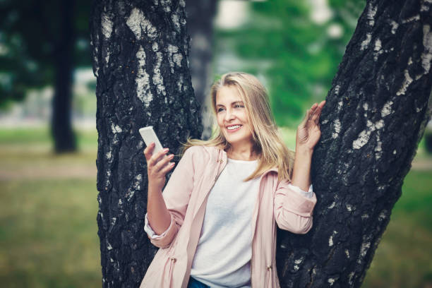 istock Woman and mobile phone 1036809464