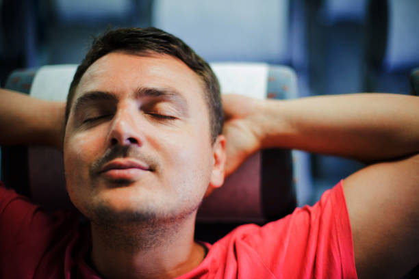Tips sleeping better. Maintaining consistent circadian rhythm is essential for general health. Man handsome guy sleeping. Get enough amount of sleep every night. Bearded man sleeping face relaxing.